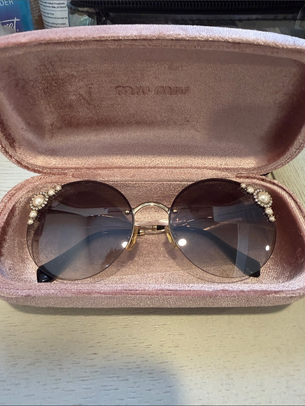 Miu Miu Gold Frame Round Sunglasses with Pink Gradient Lenses and Pearl Accents